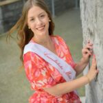 Portrait de Kimberly, candidate n°9, Miss Tournai 2025, passionnée d'immobilier, sport et reconnaissance de l'endométriose.