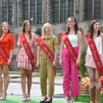 Nos Miss Tournai défilent sous le soleil à la Fashion Day, Tournai, événement mode réussi avec commerçants enthousiastes.